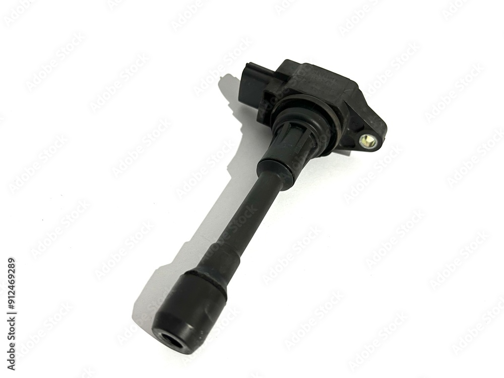 Car ignition coil spare part for starting car engine isolated on white background Car ignition coil spare part for starting car engine isolated on white background