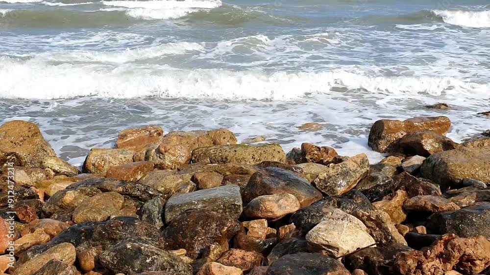 Beautiful Mediterranean Sea with rocky coastline in Spain. Beautiful waves. Summer holidays on the Costa Blanca in Spain. Storm at sea. Look at the sea and waves, relaxation, rest.