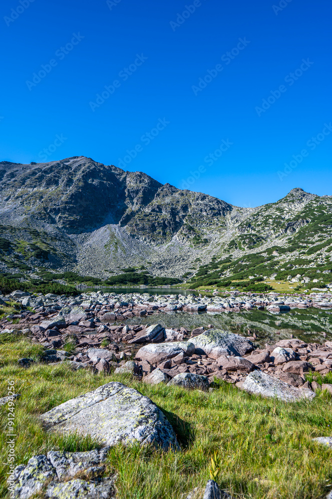 Summer landscape of the Rila mountains. The highest mountain range of Bulgaria and the Balkan Peninsula. Summer landscape of the Rila mountains. The highest mountain range of Bulgaria and the Balkan Peninsula.