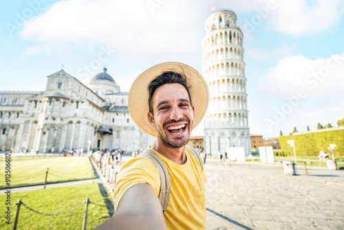 Fototapeta Happy tourist taking selfie picture in front of the famous leaning Tower and Pis