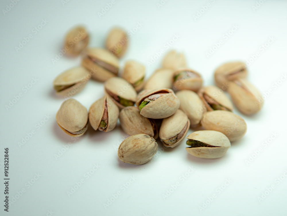 pistachios on a white background pistachios on a white background