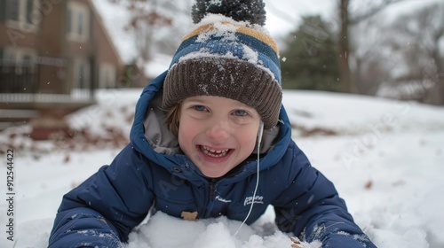 Young boy playing outdoors - low angle, energetic full body shot, vibrant blue sky background photo