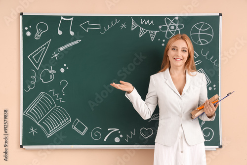 Female teacher with books n...