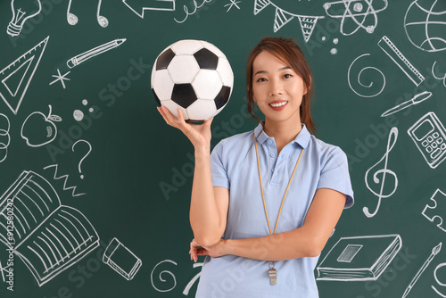 Female Asian PE teacher wit...
