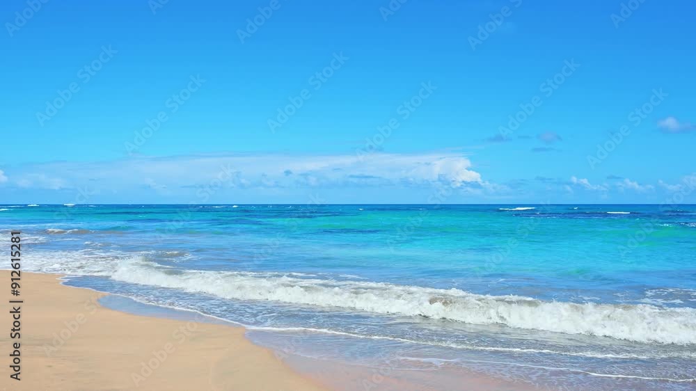 Calm beach summer background caribbean sea surface wave. Tropical seascape with clouds on horizon. Sunny sky and calm blue ocean. Travel to tropical island. Calm ocean nature.