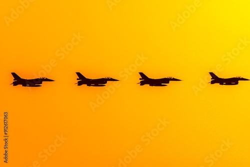 Military fighters, defenders of the sky, in flight