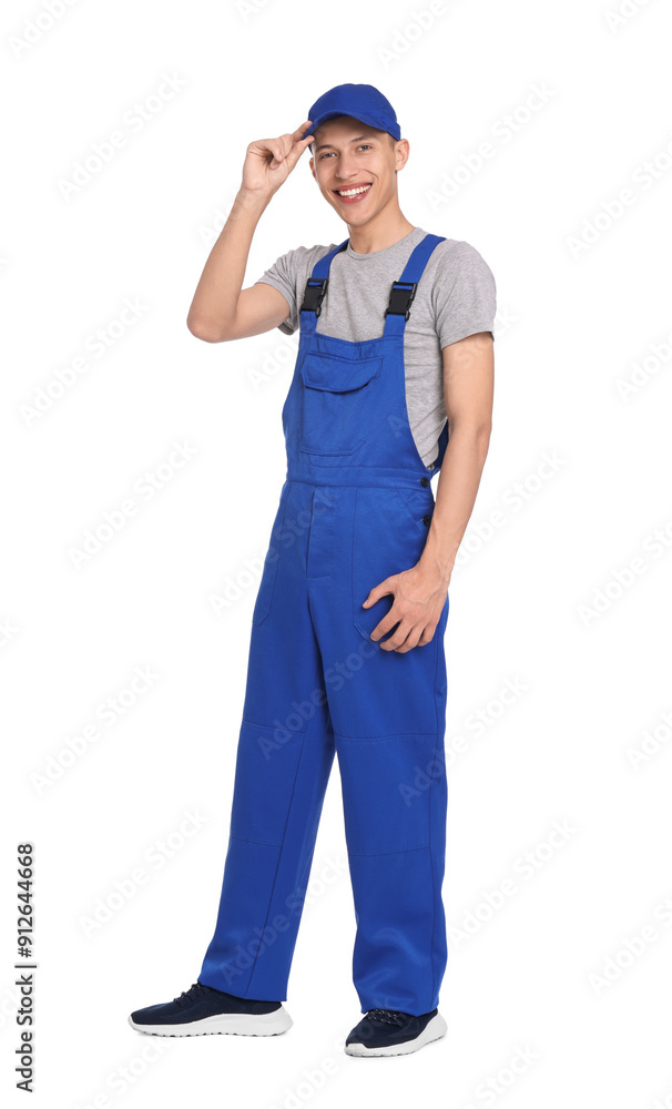 Smiling auto mechanic in uniform on white background Smiling auto mechanic in uniform on white background
