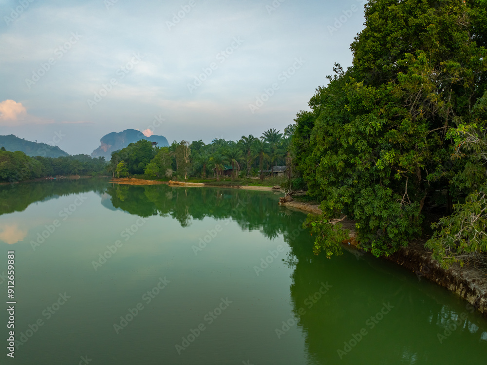Landscape Aerial view of majestic clouds in the sky sunset or sunrise over sea with reflection in the tropical sea.Beautiful landscape scenery.Amazing light of nature Landscape nature background Landscape Aerial view of majestic clouds in the sky sunset or sunrise over sea with reflection in the tropical sea.Beautiful landscape scenery.Amazing light of nature Landscape nature background