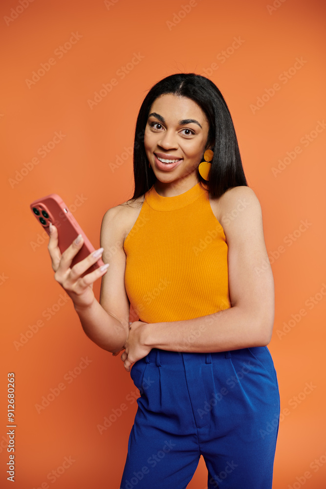 Cheerful woman engaging with her smartphone in a lively setting. Cheerful woman engaging with her smartphone in a lively setting.