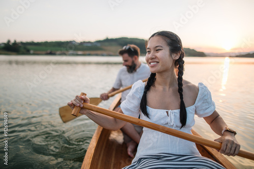 Young couple enjoy canoeing