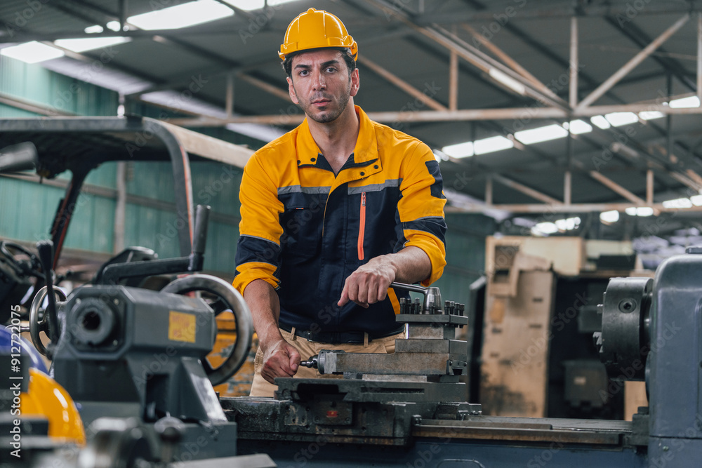 Caucasian engineer using a laptop in a factory. man working in plastics factory. Caucasian engineer using a laptop in a factory. man working in plastics factory.