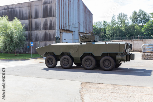 Testing of a military vehicle on wheels on the territory of the plant