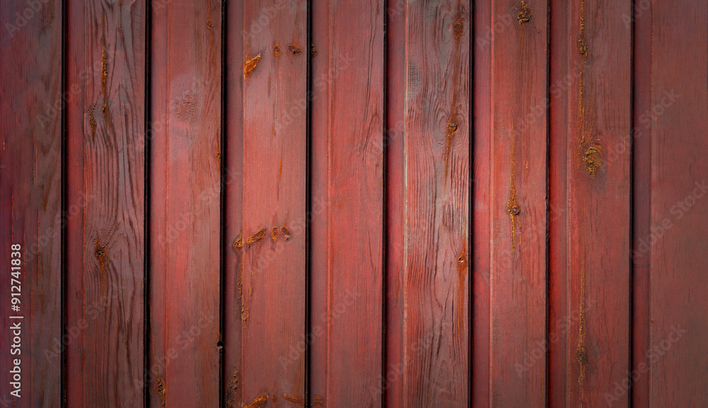 Red wooden wall, vertical wooden panels Red wooden wall, vertical wooden panels