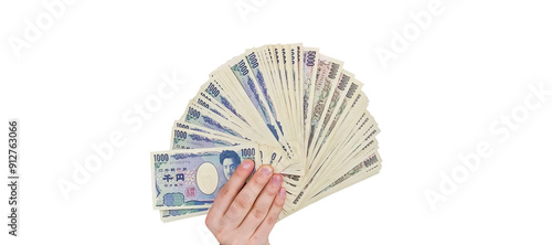 Japanese banknotes in hand on isolated background. Japan yen (JPY) crash econmy and financial market crisis concept. photo