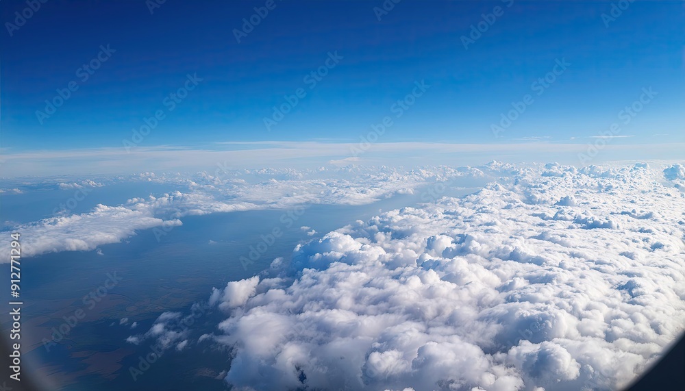 flight over the clouds. view of the clouds from the airplane window flight over the clouds. view of the clouds from the airplane window
