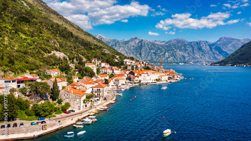 Wallpaper Mural View of the historic town of Perast at famous Bay of Kotor on a beautiful sunny day with blue sky and clouds in summer, Montenegro. Historic city of Perast at Bay of Kotor in summer, Montenegro. Torontodigital.ca