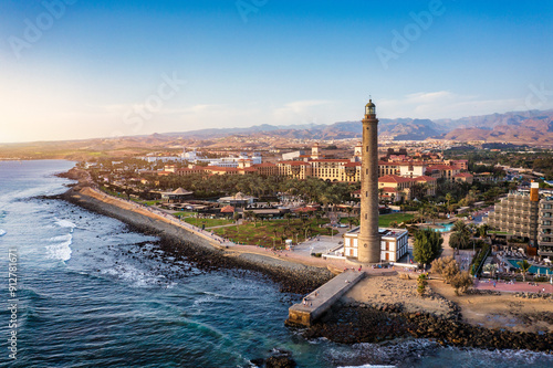 Obraz na płótnie Lighthouse of Maspalomas at Gran Canaria Island known as Faro de Maspalomas at sunset. Seascape with lighthouse and Maspalomas beach. Gran Canaria, Canary Islands, Spain w salonie