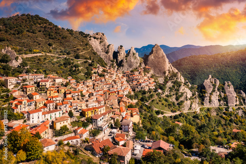 The picturesque village of Castelmezzano, province of Potenza, Basilicata, Italy. Cityscape aerial view of medieval city of Castelmazzano, Italy. Castelmezzano village in Apennines Dolomiti Lucane. photo