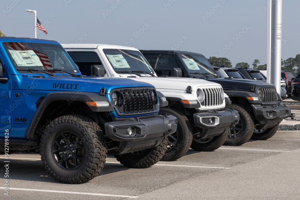 Jeep Wrangler display at a dealership. Jeep offers the Wrangler in ...