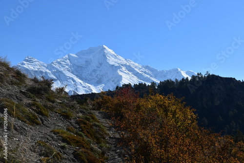 Kicho Tal, the Ice Lake and surrounding glaciers and mountains as seen while hiking the Annapurna Circuit Trek in Nepal, Himalaya