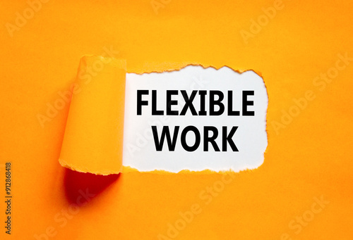 Flexible work symbol. Concept words Flexible work on beautiful white paper. Beautiful orange paper background. Business Flexible work concept. Copy space.