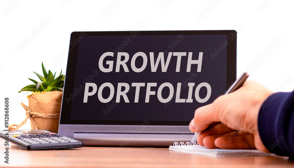 Growth portfolio symbol. Concept words Growth portfolio on beautiful black pad. Beautiful white background. Businessman hand. Calculator. Business Growth portfolio concept. Copy space. Growth portfolio symbol. Concept words Growth portfolio on beautiful black pad. Beautiful white background. Businessman hand. Calculator. Business Growth portfolio concept. Copy space.