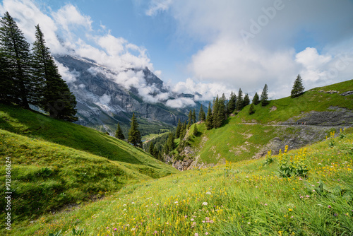 Oeschinensee Lake hike in Switzerland, near Kandersteg in the Swiss Alps