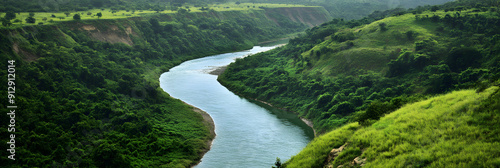 River flowing through a lush green valley