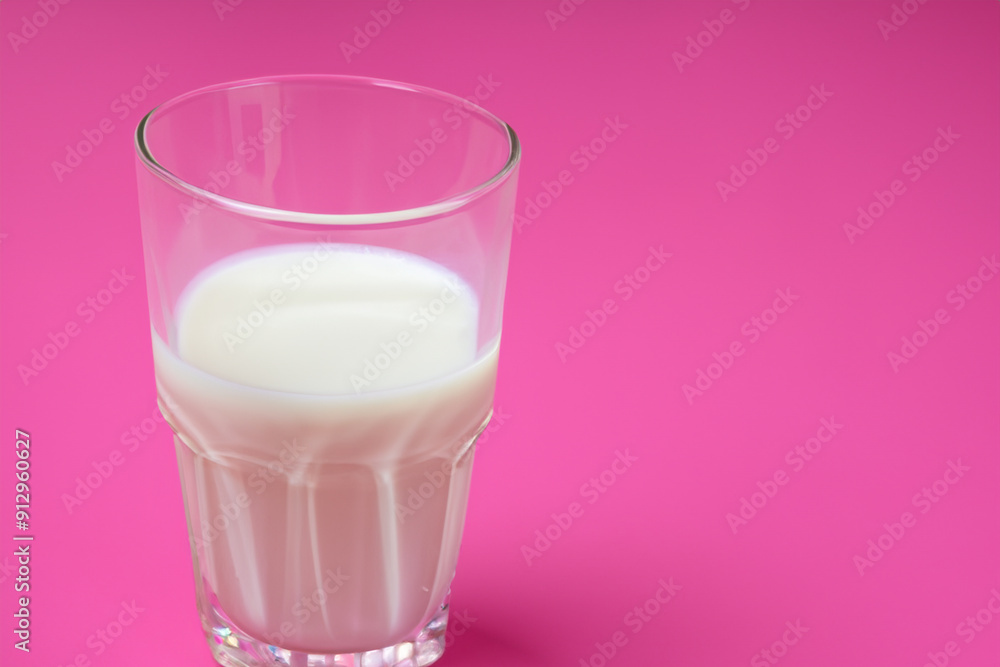 A glass of milk on a pink . Strawberry shake chocolate concept. Milk and pink in the with transparent glass. A glass of milk in the of a lifestyle transparent glass. A glass of milk on a pink . Strawberry shake chocolate concept. Milk and pink in the with transparent glass. A glass of milk in the of a lifestyle transparent glass.