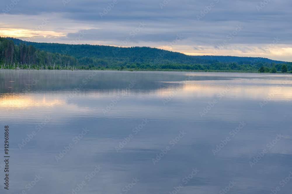 Fototapeta premium wide river and forest on the horizon