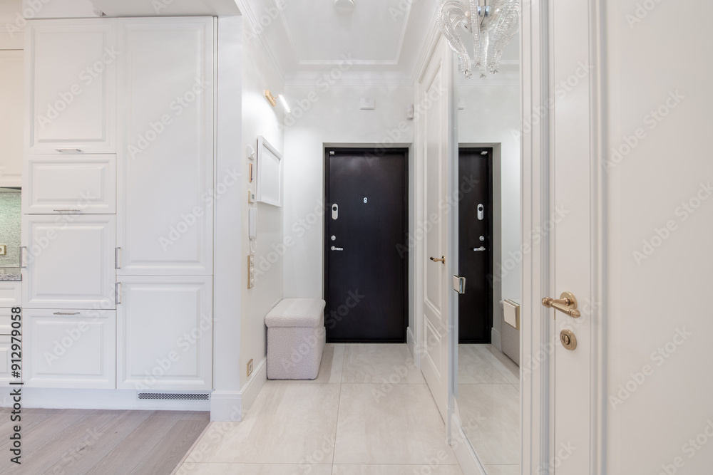 Home Entrance Hall. Interior. Wooden Black Door, Brown Flooring. Minimalism. LED Light. Closed Doors to Living Room. White Bench Home Entrance Hall. Interior. Wooden Black Door, Brown Flooring. Minimalism. LED Light. Closed Doors to Living Room. White Bench