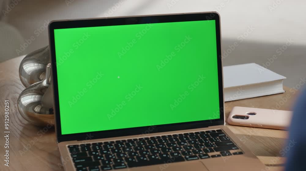 Green screen laptop placed office closeup. Unrecognizable freelancer browsing Green screen laptop placed office closeup. Unrecognizable freelancer browsing