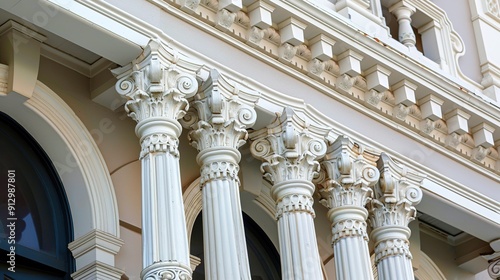 Detailed Close-Up View of Ornate Architectural Columns on Historic Building Exterior