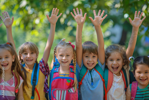 Happy Kids with Backpacks on the First Day of School