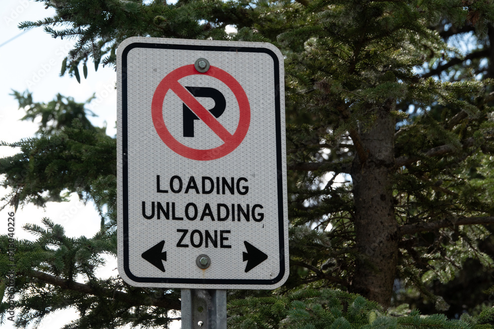 No parking sign for loading and unloading zone No parking sign for loading and unloading zone