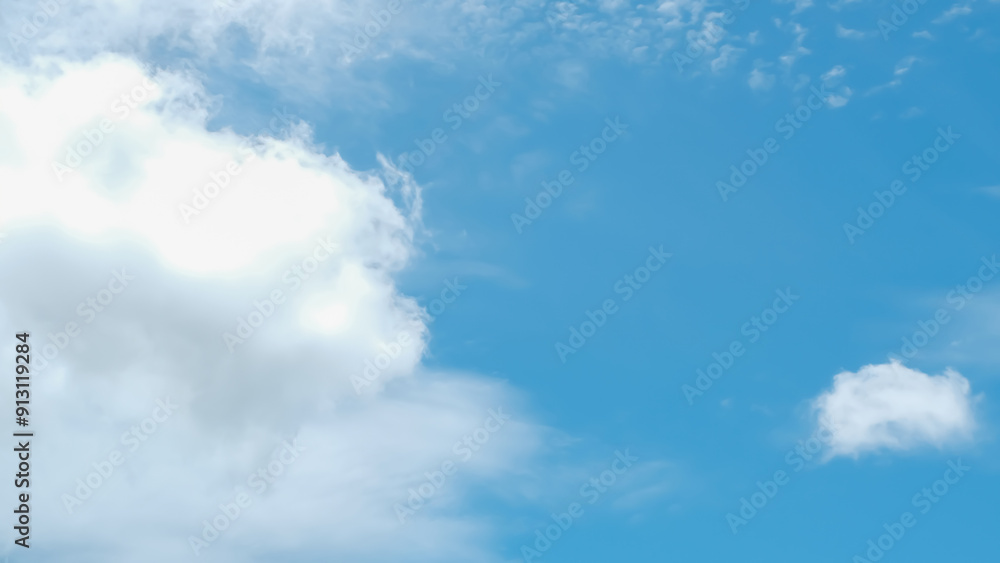 Bright blue sky with scattered fluffy white clouds, perfect for nature backgrounds and weather-related content. Bright blue sky with scattered fluffy white clouds, perfect for nature backgrounds and weather-related content.