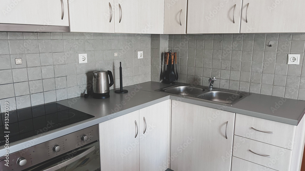 Minimalist kitchen . side view, no people. Minimalist kitchen . side view, no people.