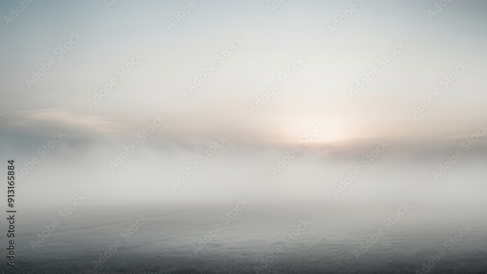 Obraz premium A foggy, cloudy sky with a sun in the background