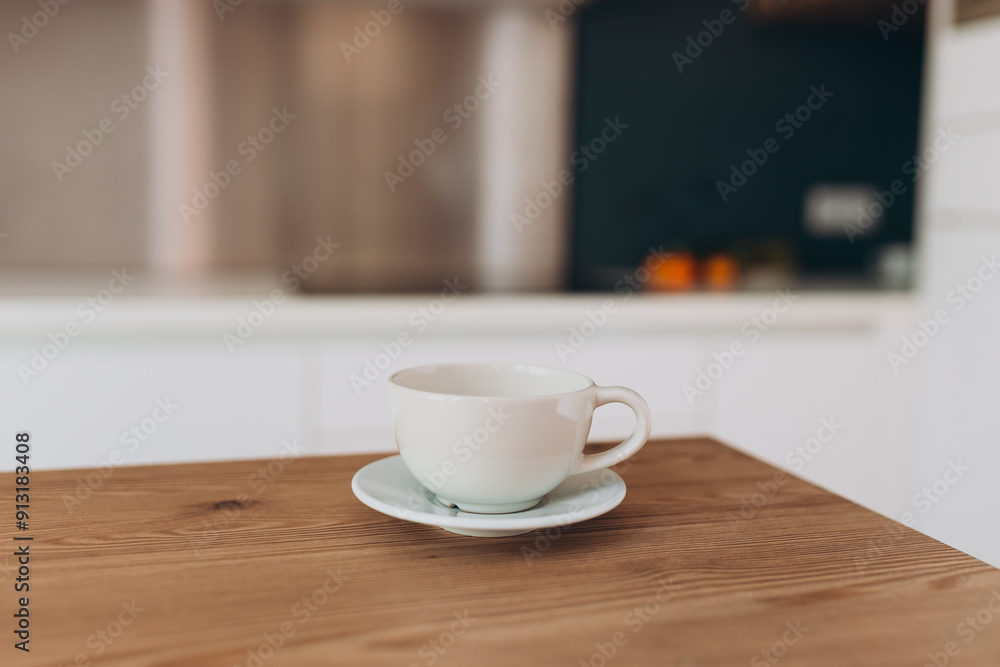 Empty ceramic mug mockup product display with blurry kitchen background. Empty ceramic mug mockup product display with blurry kitchen background.