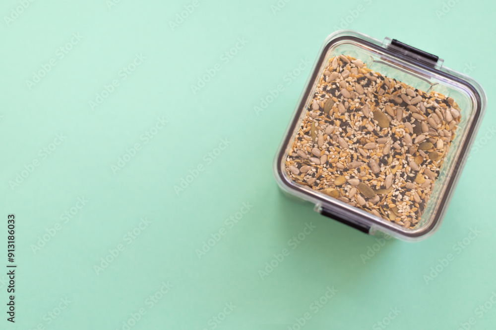 salad seeds in a transparent container salad seeds in a transparent container