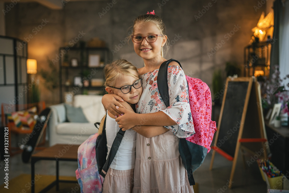 Obraz premium Portrait of young girls children with backpack, ready for school