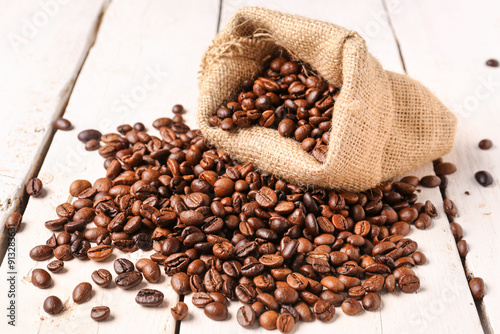 Bag with coffee beans on li...