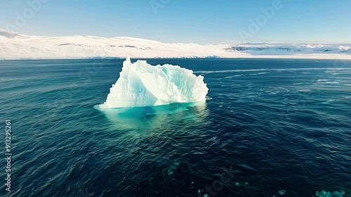 A large ice block floating in the ocean
