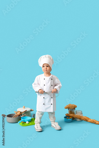 Cute little chef with cooki...