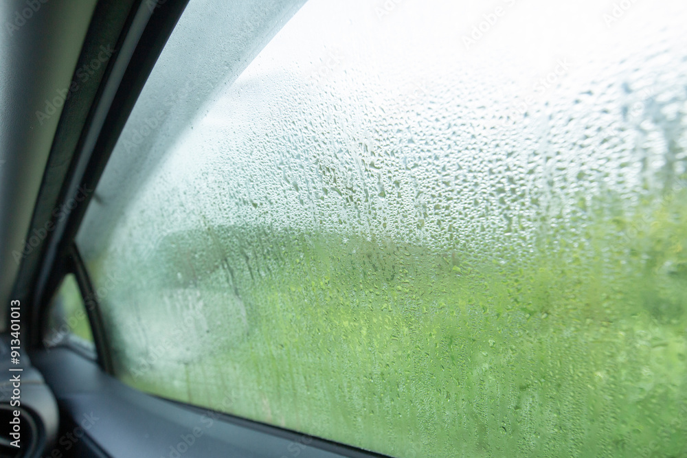 Obraz premium wet condensation on car window drivers side