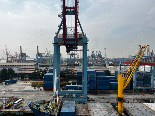 Container Ship Docked In The Port For Loading And Unloading Containers photo