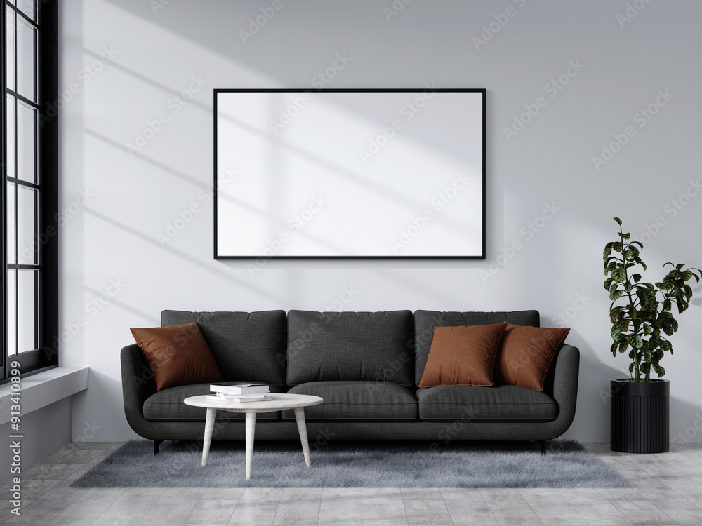 Modern Minimalist Living Room with Black Sofa, White Coffee Table, and Blank Picture Frame on Wall Modern Minimalist Living Room with Black Sofa, White Coffee Table, and Blank Picture Frame on Wall