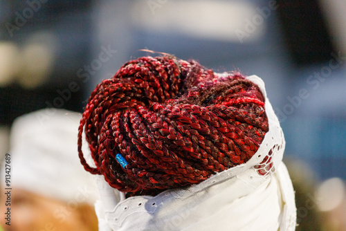 red hair braid on a woman's head in Rio de Janeiro. photo