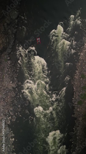 Top down vertical aerial of rafter in Snake River rapids on Hells Canyon Idaho photo