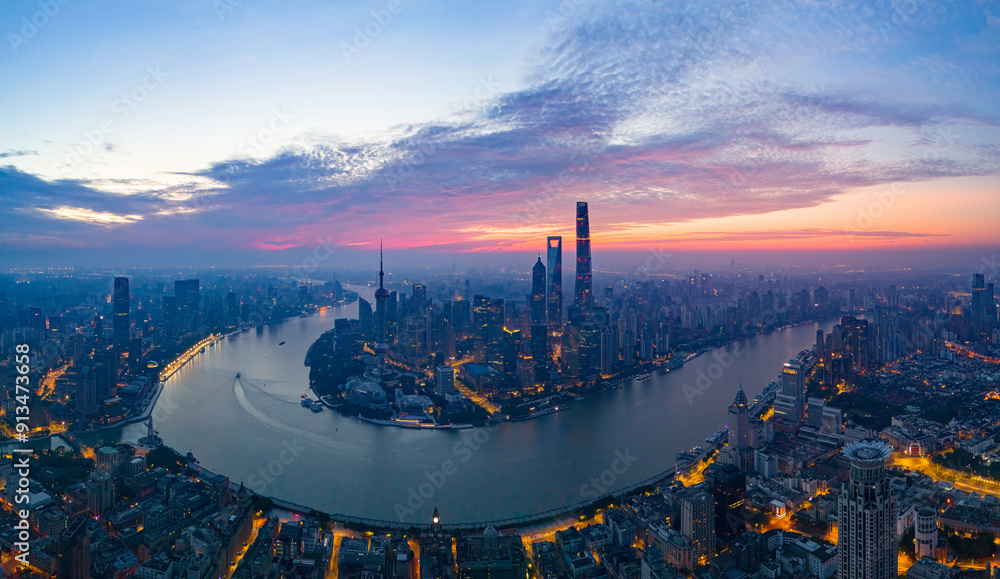Obraz premium Aerial view of modern city skyline and buildings at sunrise in Shanghai